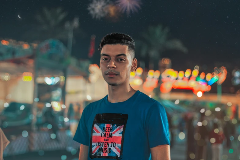 a guy looking at a picture and fireworks