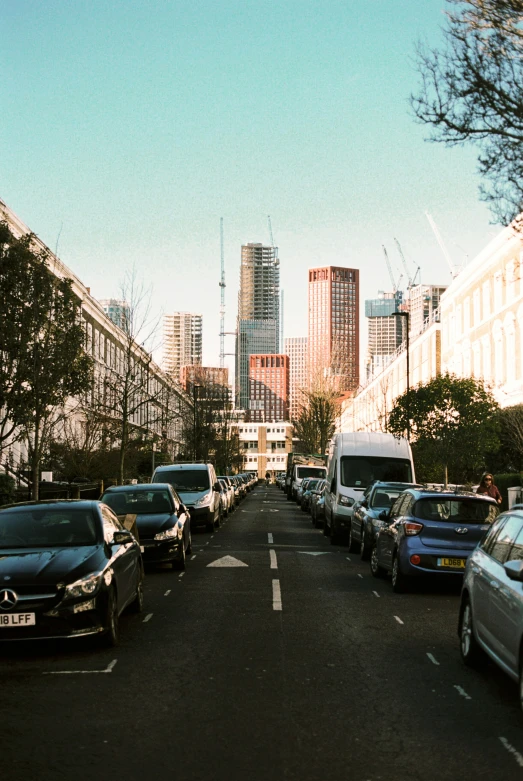 a street scene with a group of cars on it