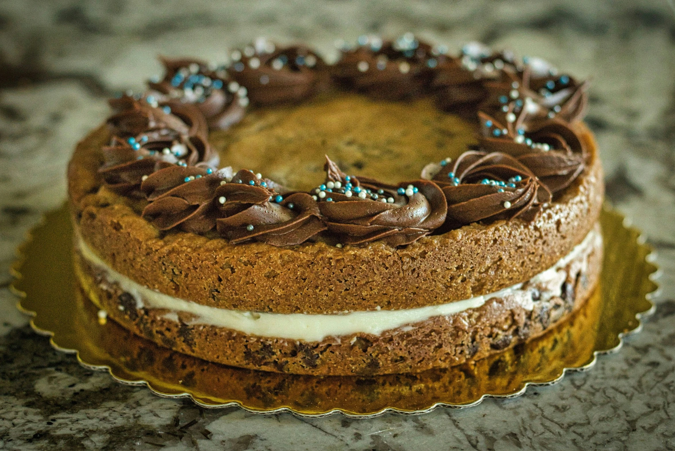 there is a brown cake that is on the plate