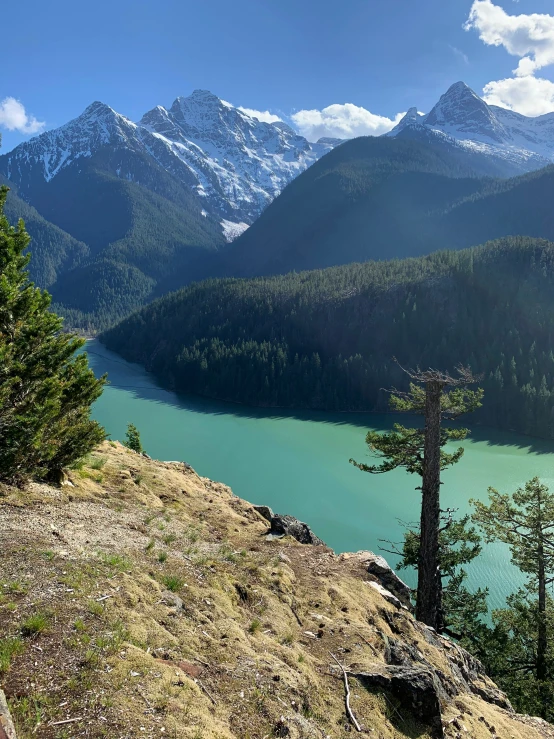 a view of a large mountain and lake