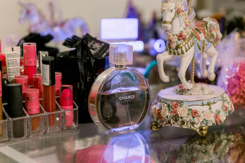 a perfume bottle sitting on top of a counter