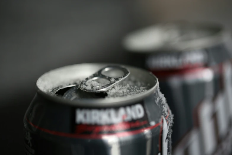 closeup of a pair of cans with salt