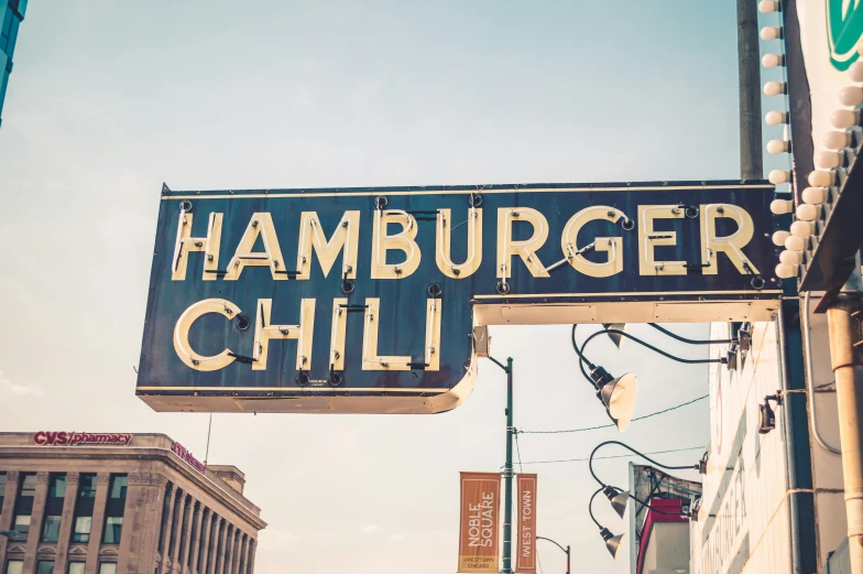 a large sign advertising hamburger's in the city