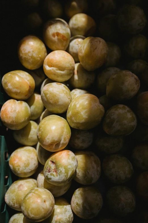 some pieces of fruit are piled next to each other