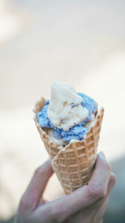 a cone with some kind of blue and white stuff inside of it