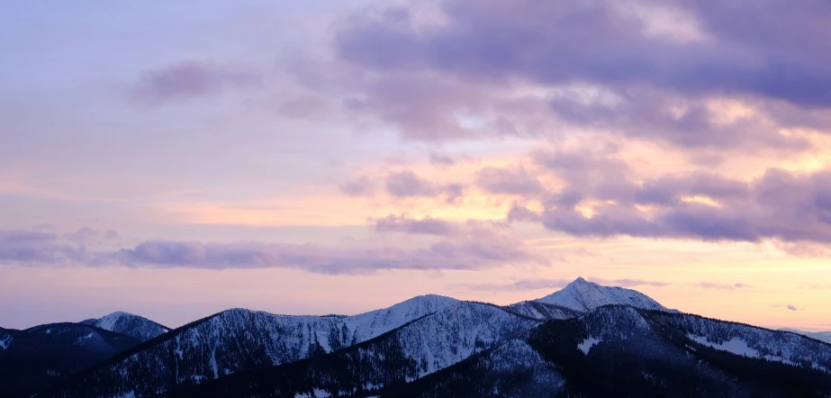 a mountain with some mountains in the background