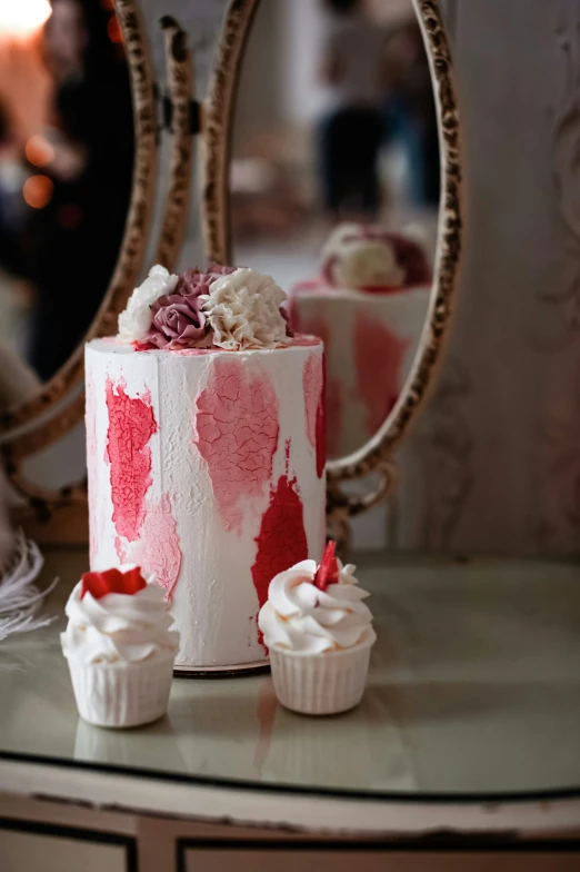 a cake is decorated with flowers and icing