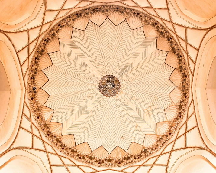 a large intricate ceiling inside an ancient building