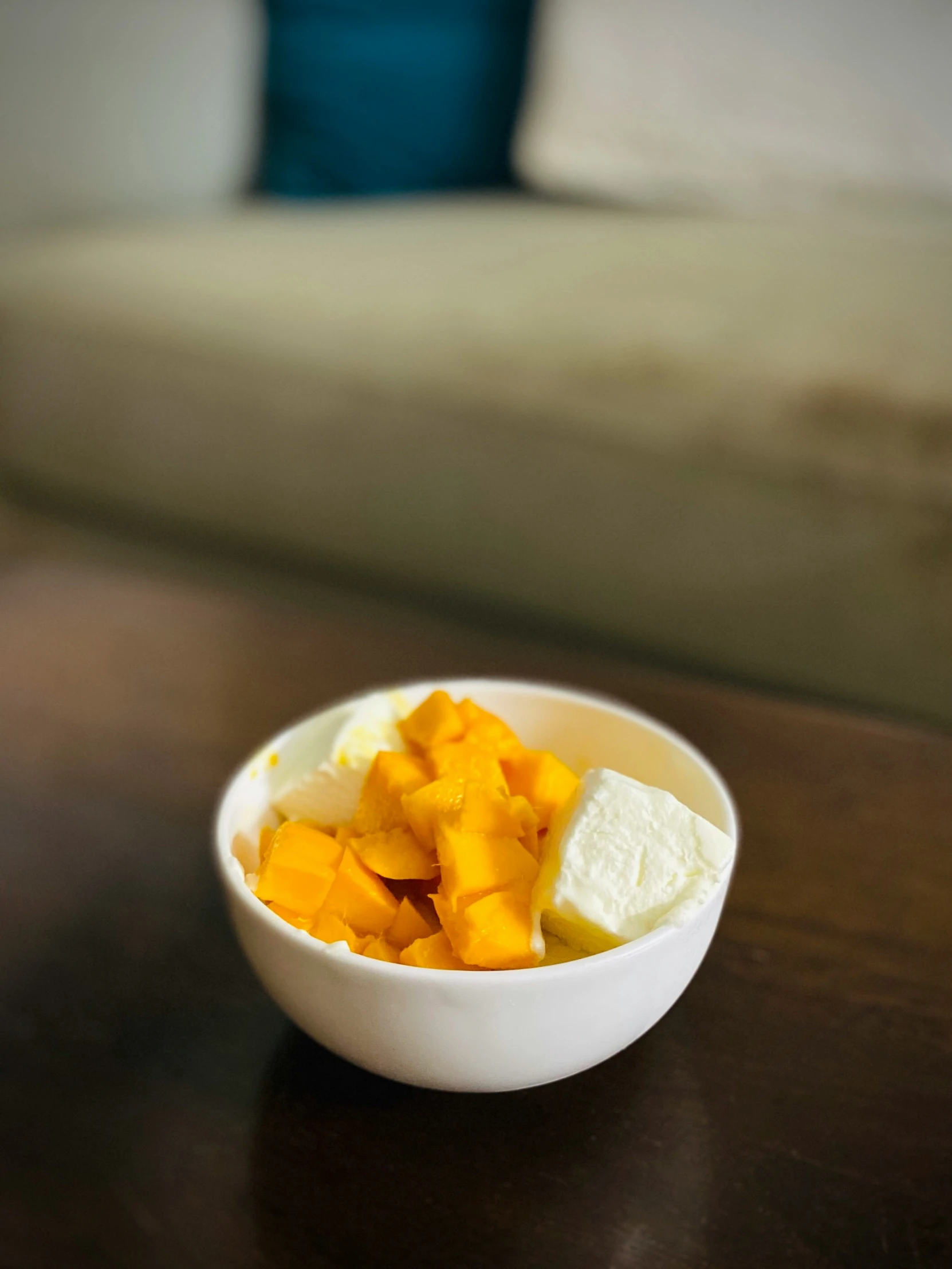 fruit bowl with yogurt and banana on a table