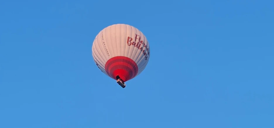 there is a  air balloon high in the sky