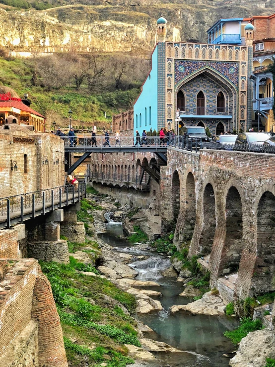 a long bridge with some buildings on top