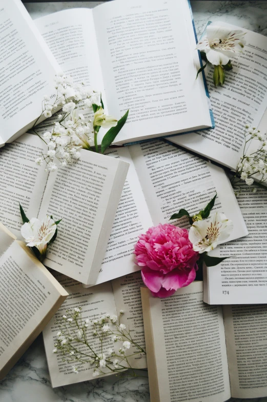 flowers on top of an open book