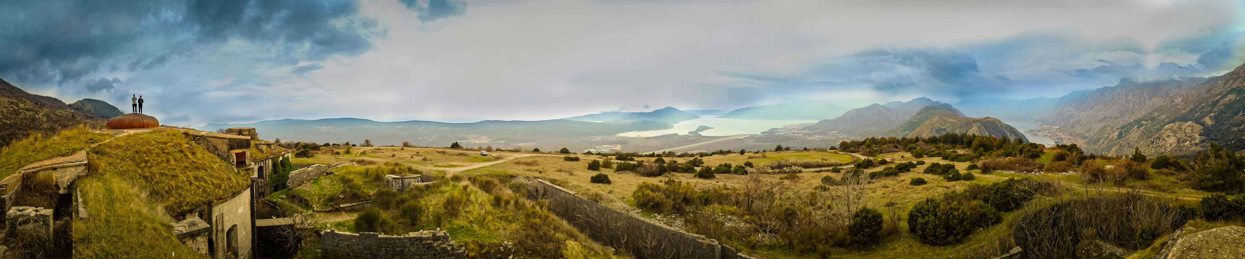 an image of a landscape with mountains and trees