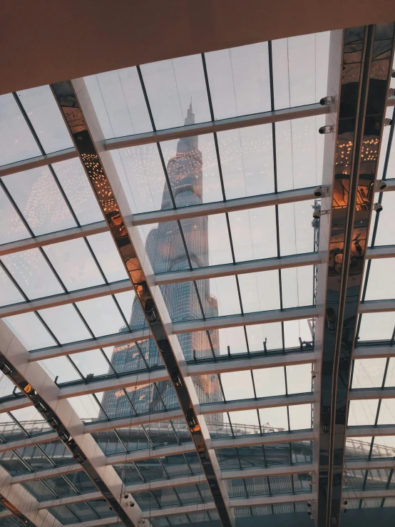 a city skyline reflection in a glass enclosed area