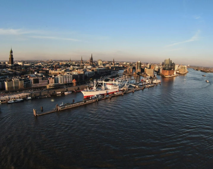 a large river runs past the city skyline