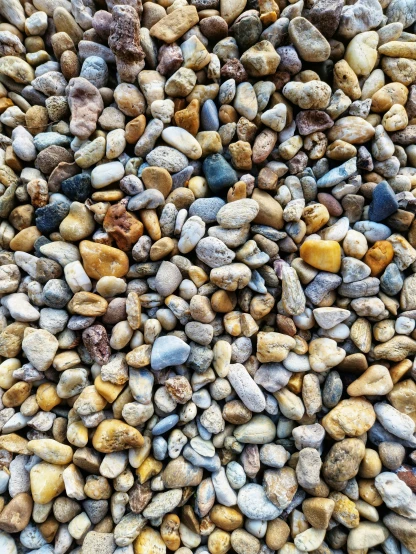 a large pile of rocks with the focus on one one