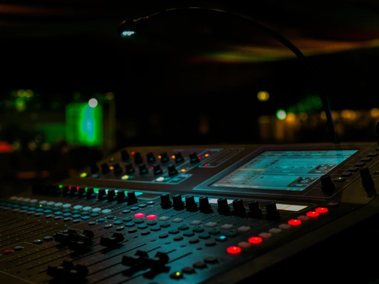 a sound board sitting on top of a black table