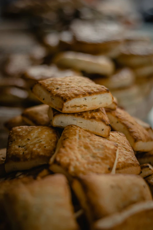 small ers sitting in the middle of an area filled with other biscuits