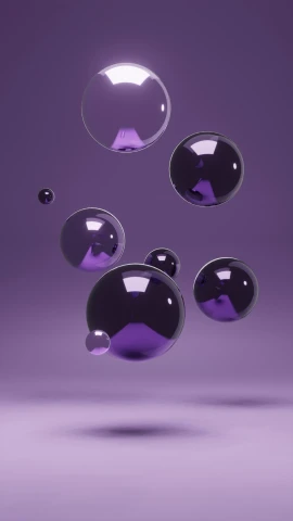 a number of bubble like objects flying through the air