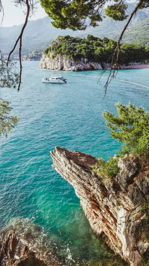 a body of water with boats floating near by