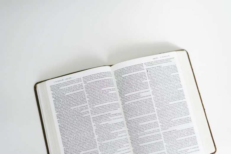 an open book sitting on top of a table