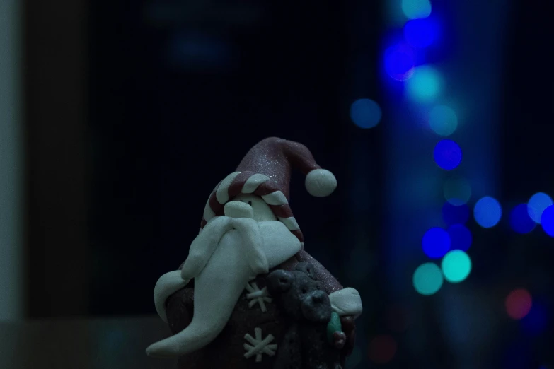 a christmas - themed dog decoration on a tree