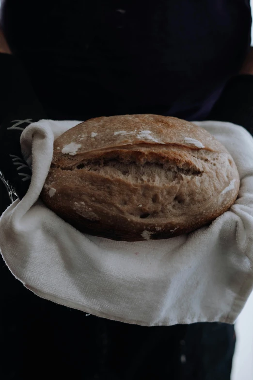 an image of a loaf of bread on a napkin