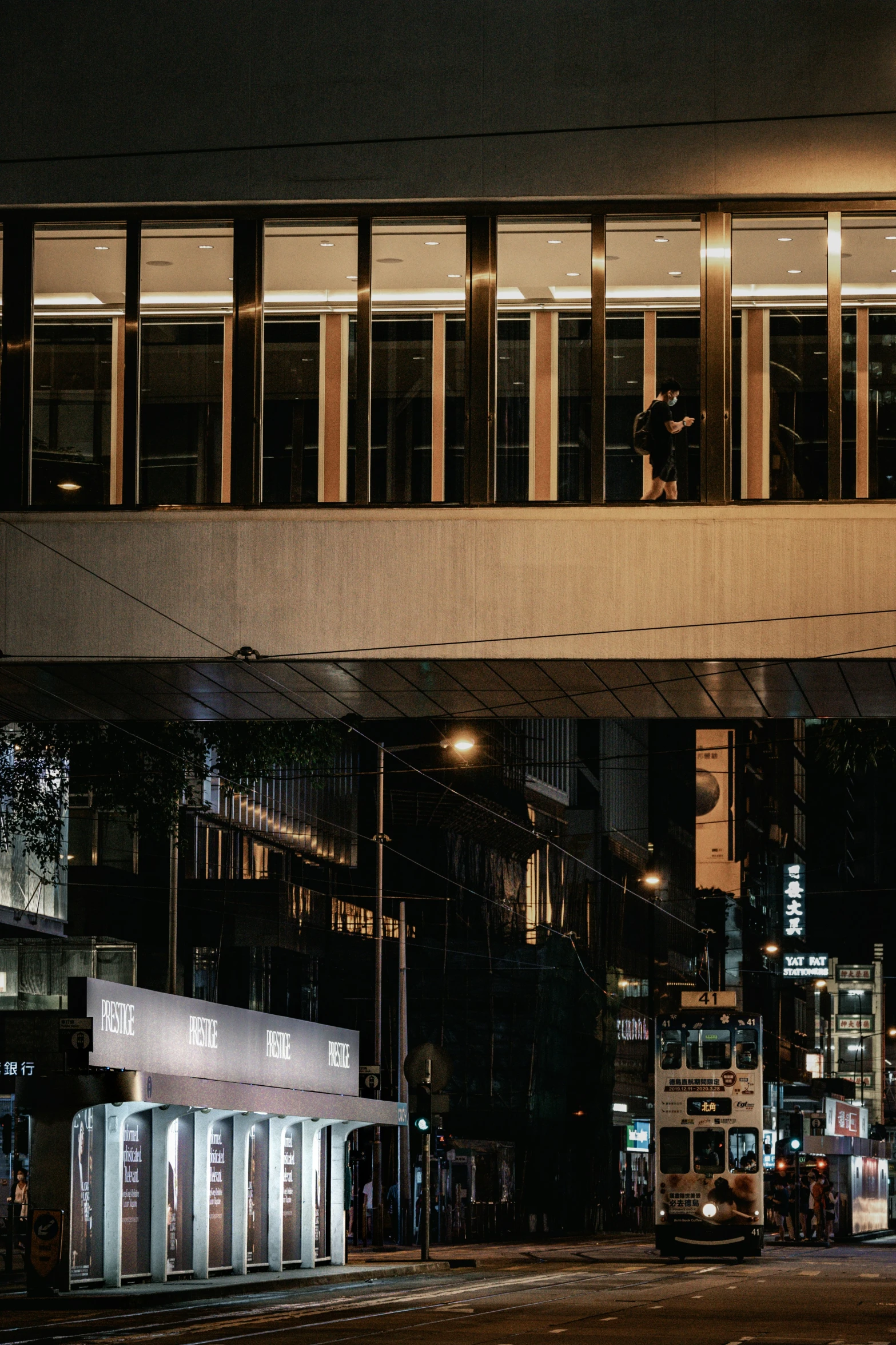 street with multiple stores next to buildings at night