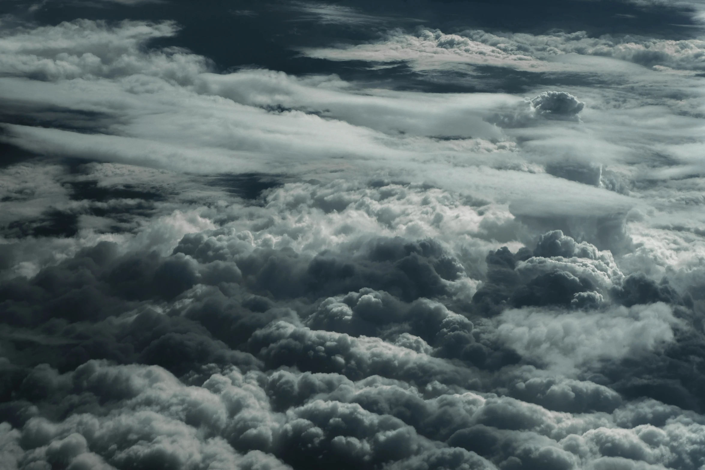 view from an airplane of a number of clouds