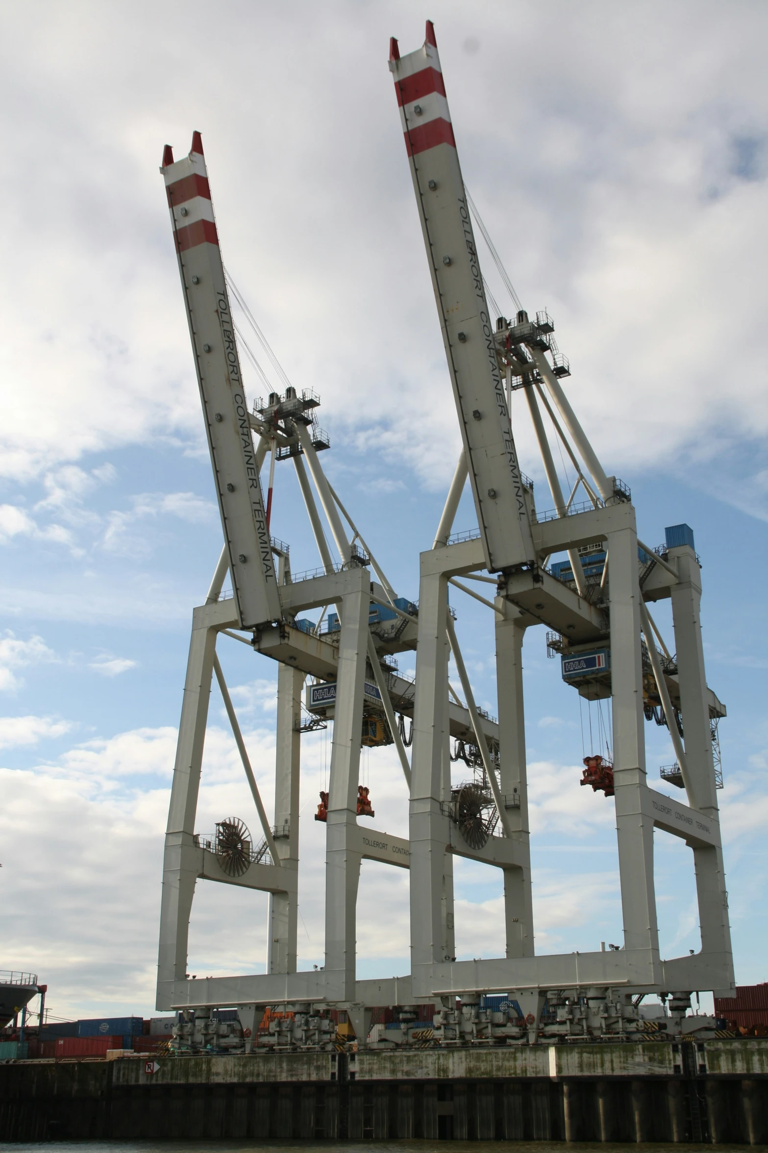 a large crane is sitting on top of a boat