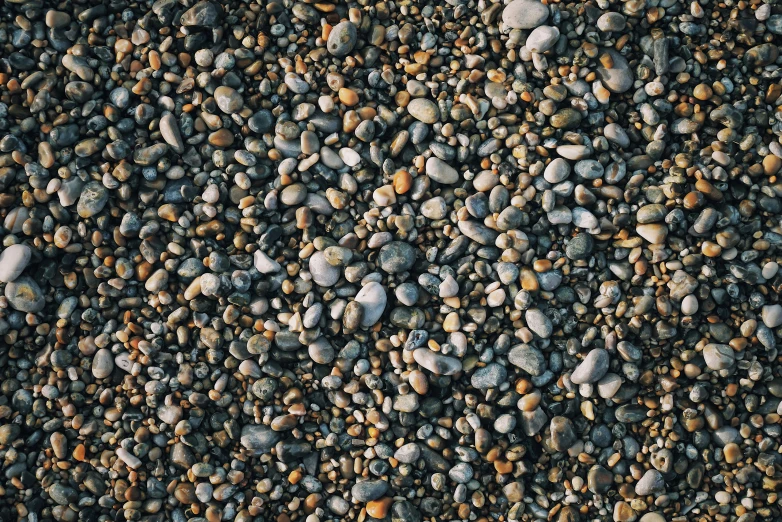 close up of some small rocks in dirt