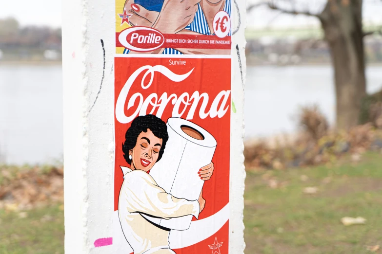 the poster shows a woman with a large roll of toilet paper