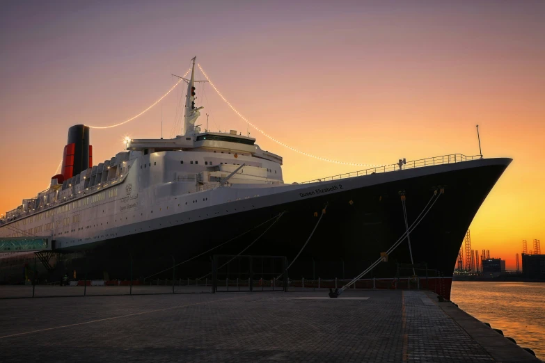 a large ship is docked in the water