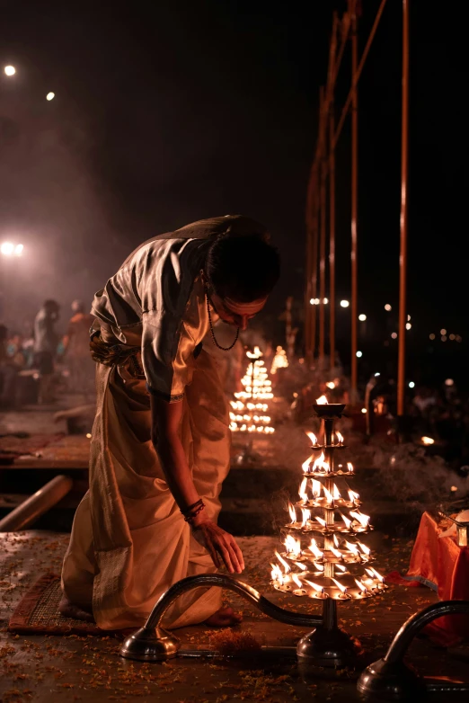 a man who is preparing food on a table