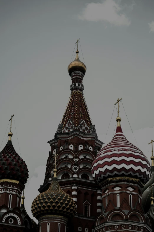 the view of the roof of an ornate building with multiple spires