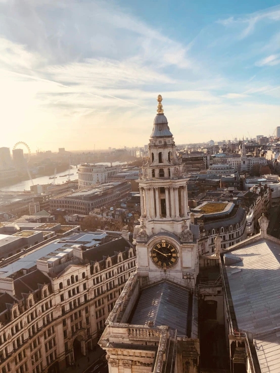 an aerial view of london city with buildings and a steeple