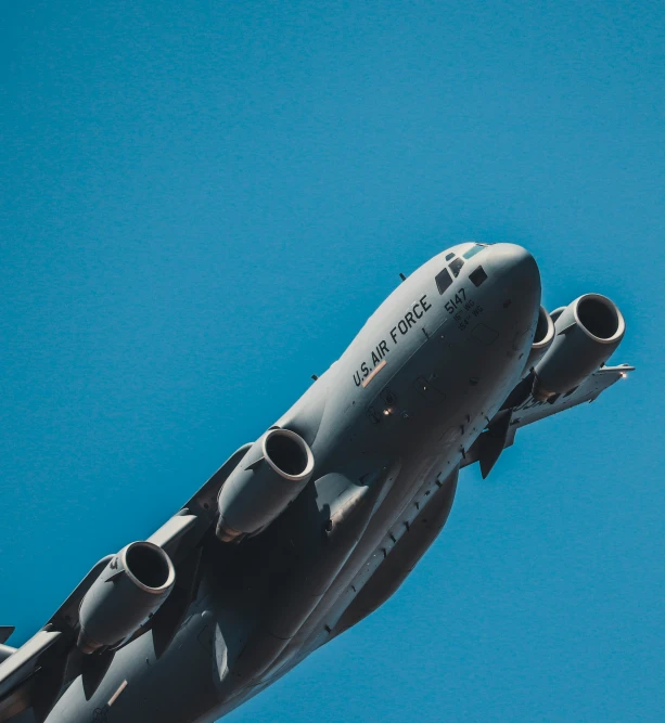 a large air plane flying in the sky