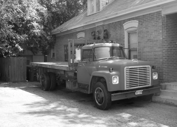 a big truck that is parked outside of a building