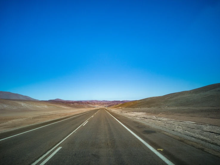 an empty highway in the middle of nowhere