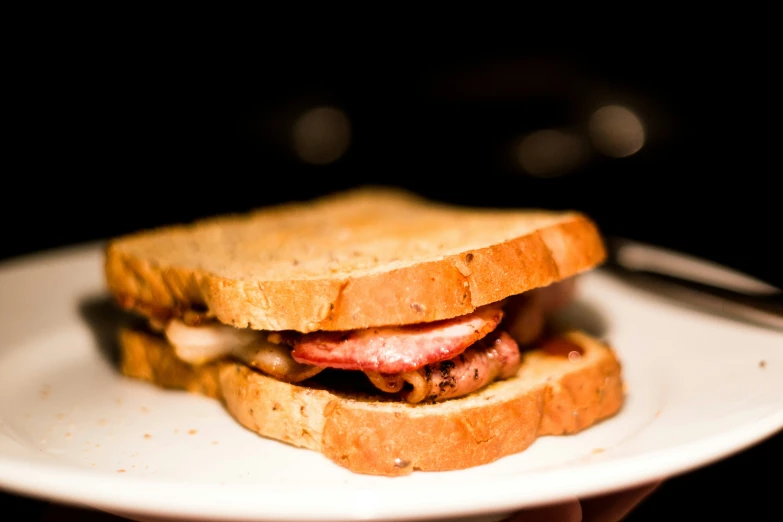 a sandwich that is on top of a white plate