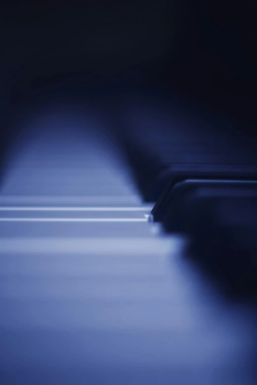 an piano that is blue and has only a light on