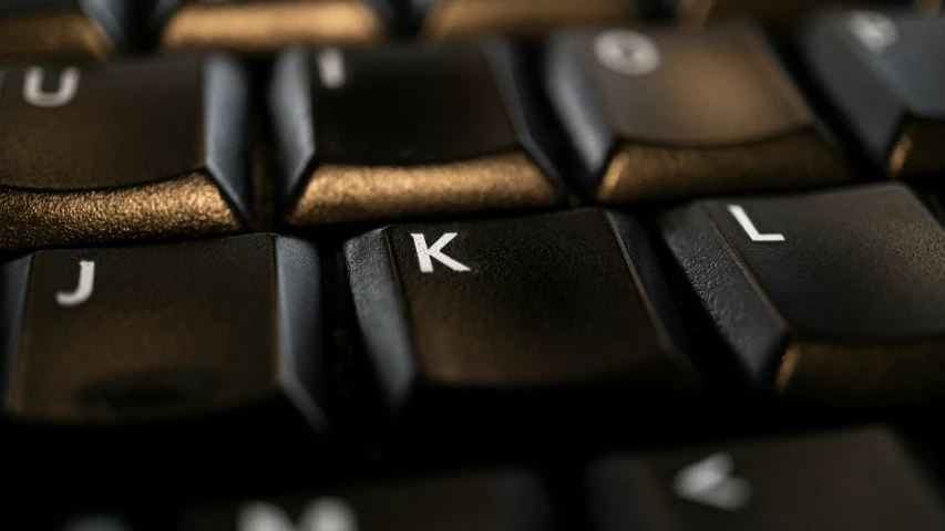 a close up po of a black keyboard