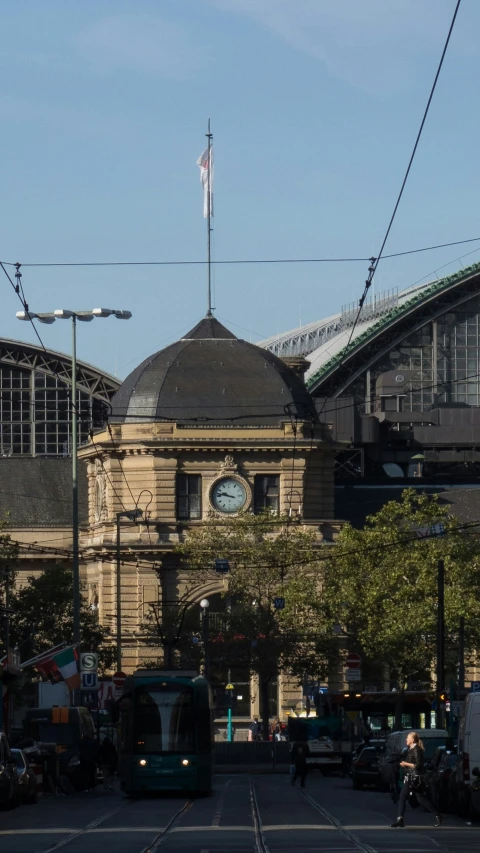 an old building sitting in the middle of the city