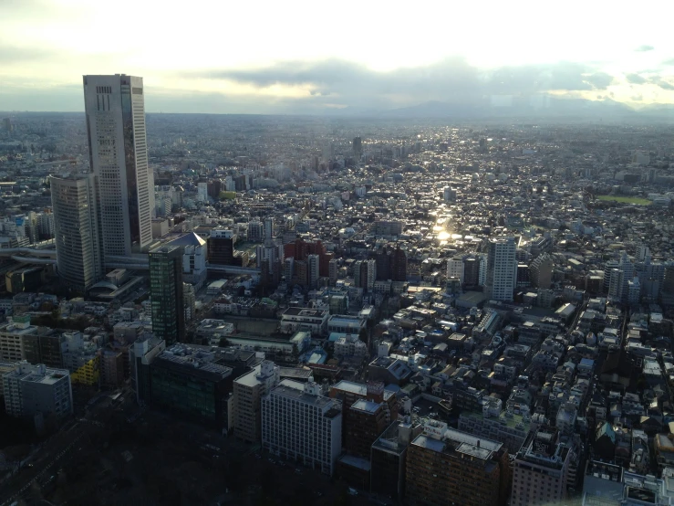 an aerial view of a very large city with tall buildings