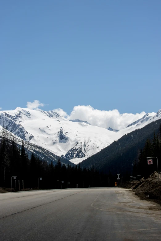 a mountain is covered in snow in the distance