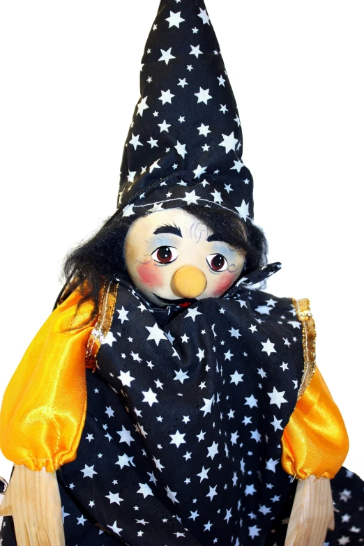 a stuffed bird in a black and yellow outfit