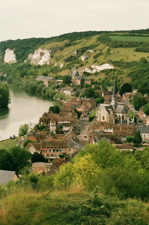 the small village is located next to the river