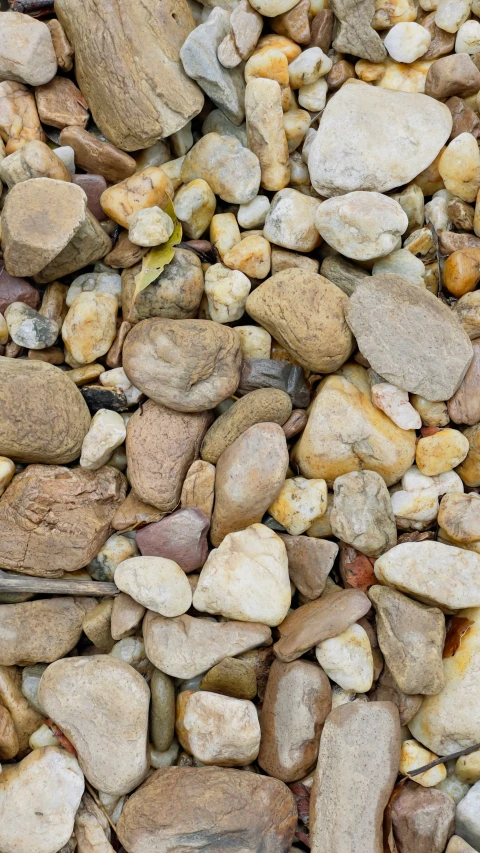 a pile of rocks and stones laying on top of each other