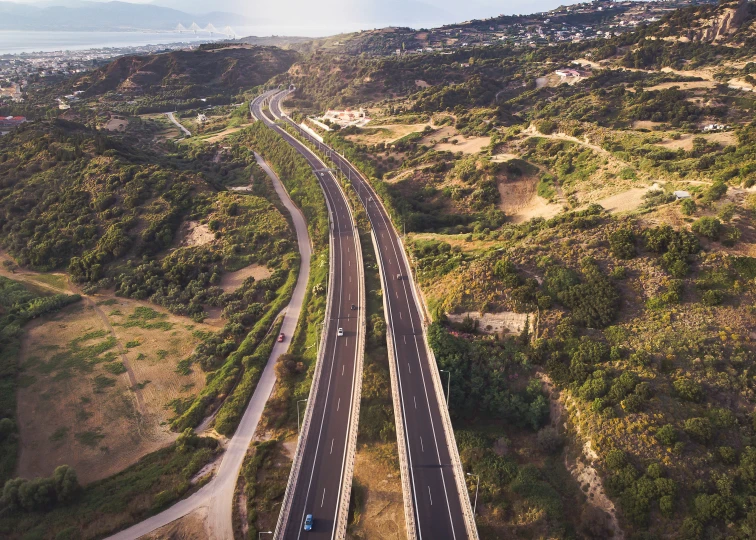 an aerial s of two roads going through the countryside