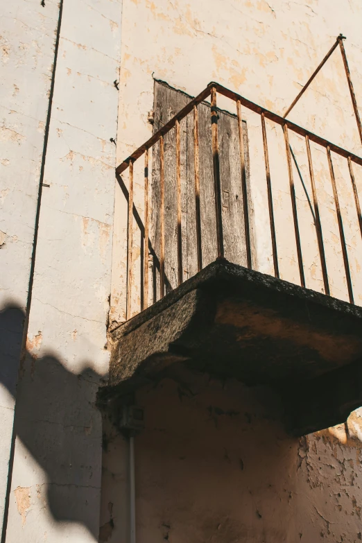 a very close - up view of a balcony with rusted iron bars